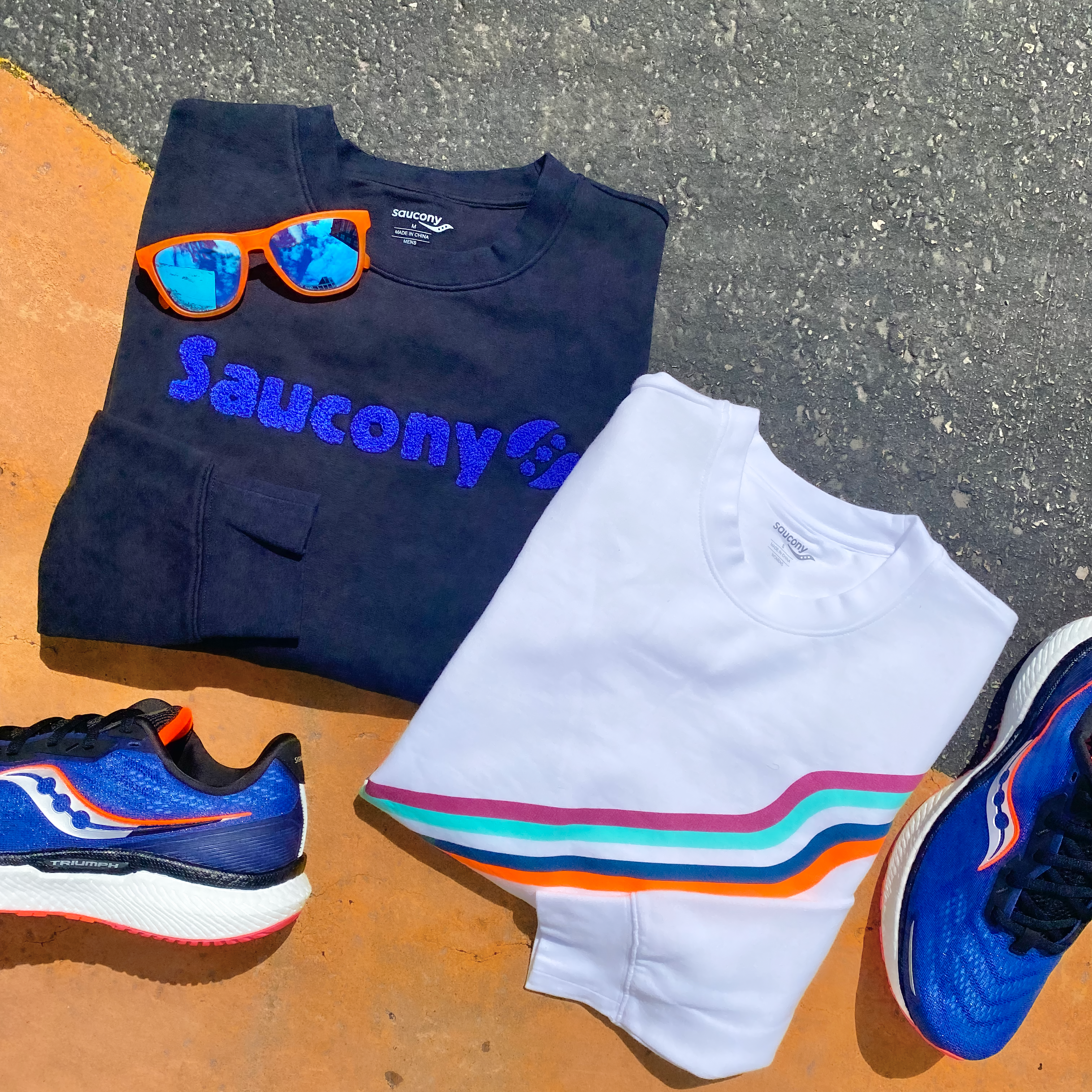 picture of saucony tops, shoes and goodr sunglasses.