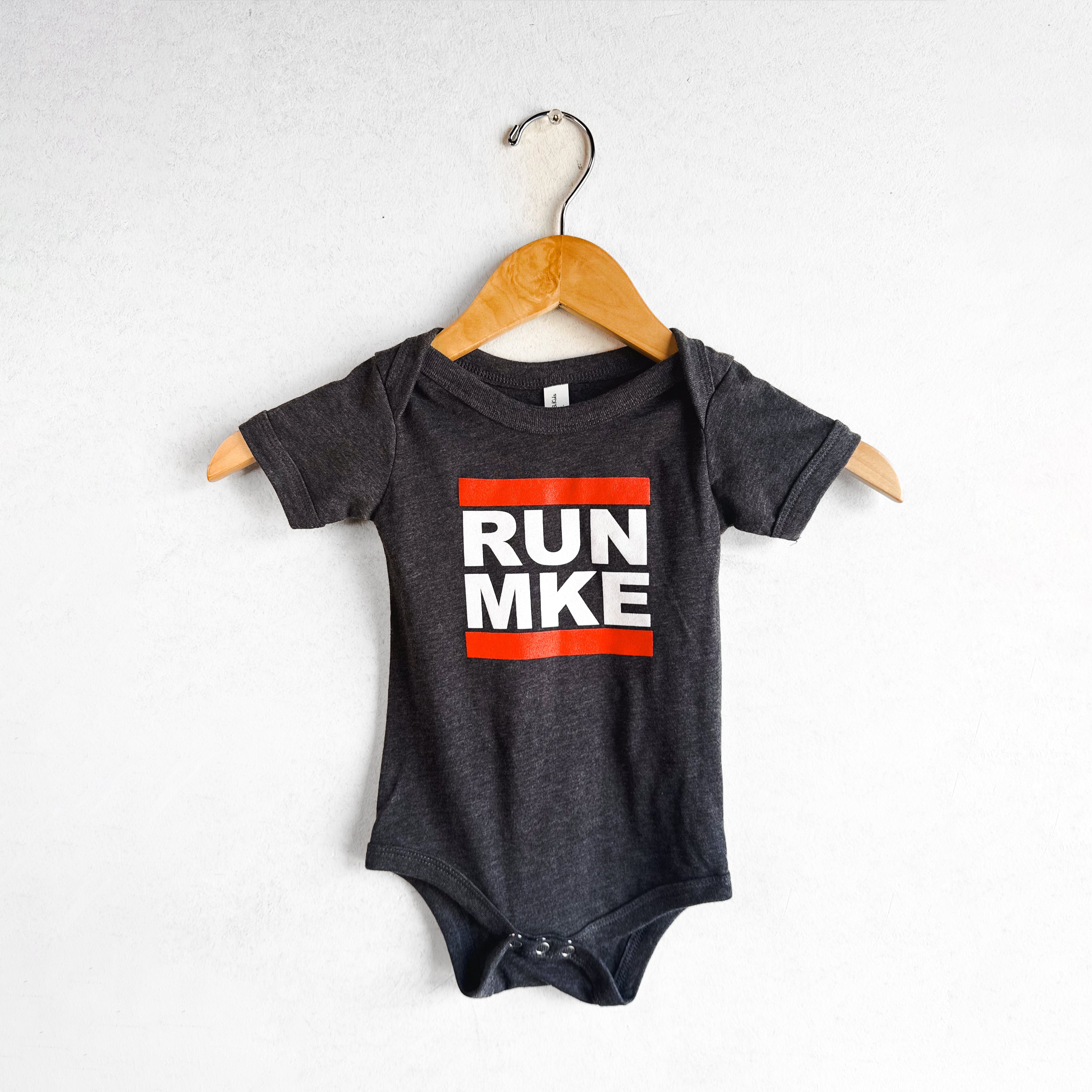 PR GEAR RUN MKE BABY ONESIE TEE BLACK TRIBLEND