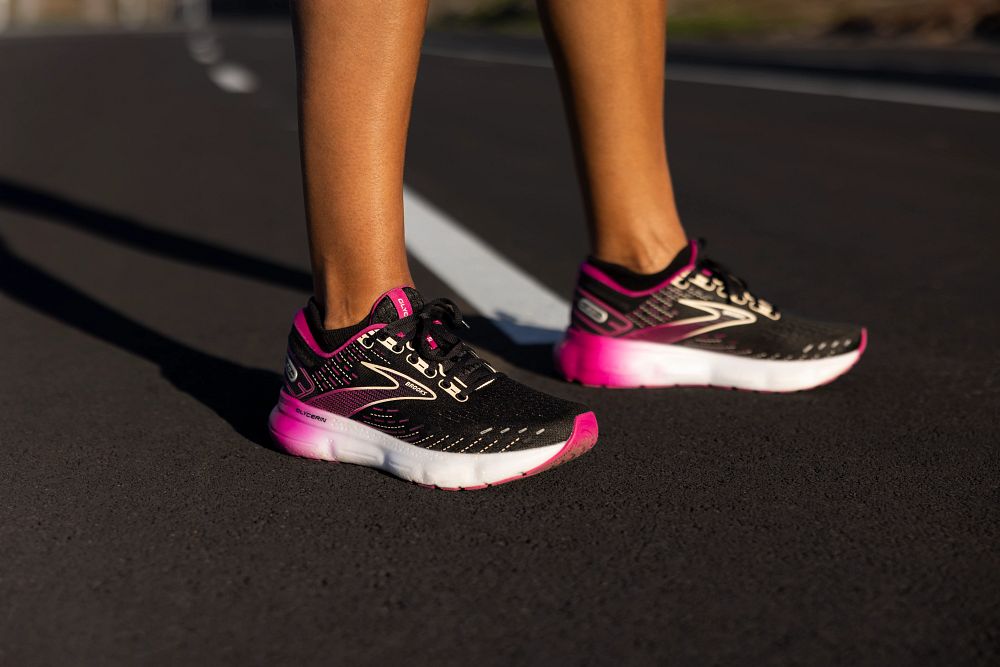 picture of a women's feet wearing running shoes.