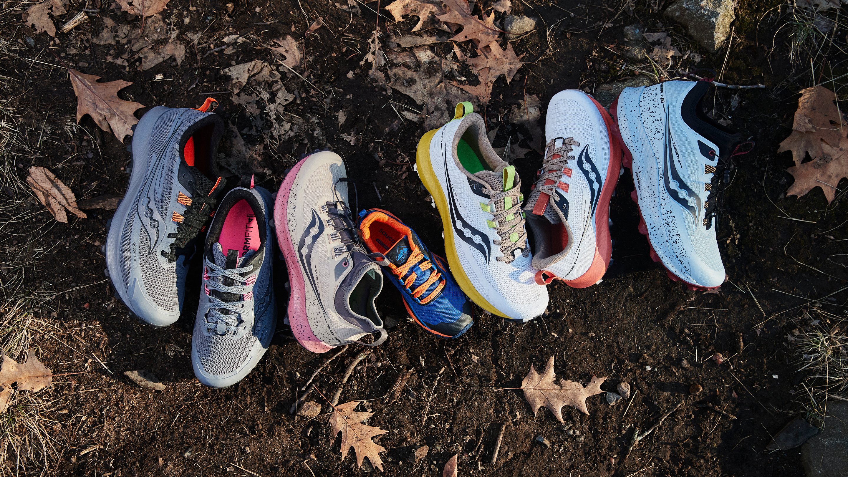 Saucony pergrin shoes laid out in different colors