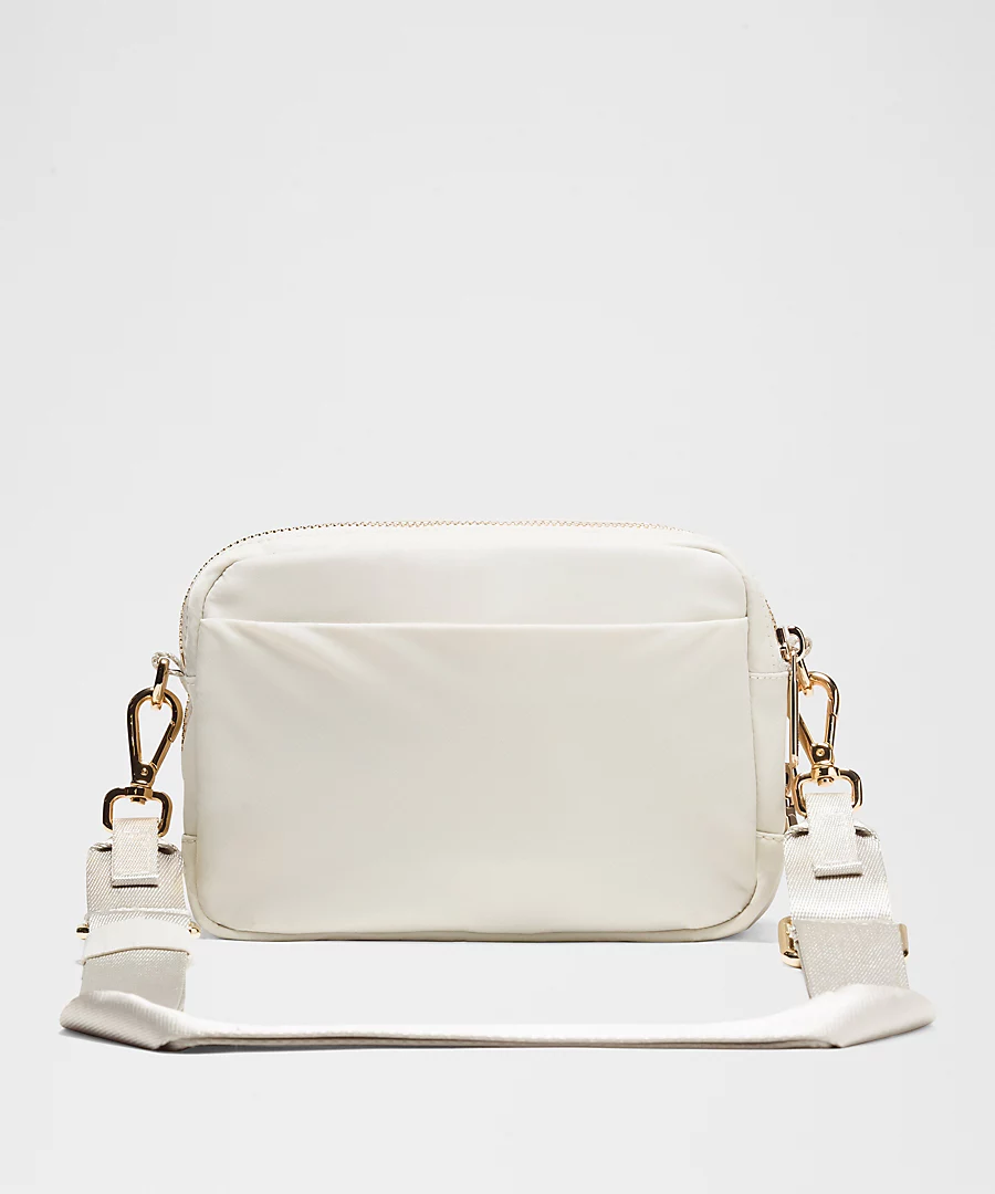 LULULEMON EVERYWHERE CROSSBODY BAG -- BONE/GOLD 