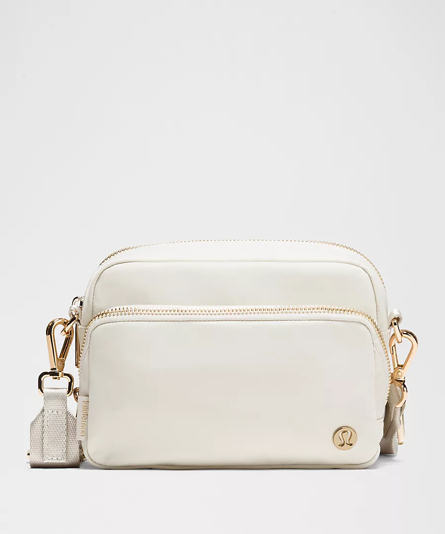 LULULEMON EVERYWHERE CROSSBODY BAG -- BONE/GOLD 